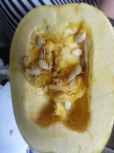 Inside of the squash getting scooped out...