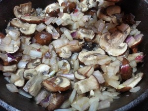 Mushrooms and shallots enjoying being sauteed...