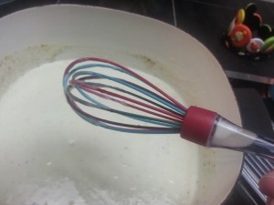 Ready to have the cheese added to it. You can see the milk combo sticking to the whisk....