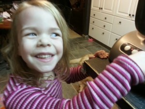 Youngest controlling the food processor...