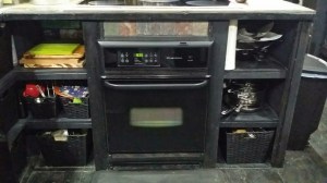 This is my wall oven and open shelves that surround it. My induction top cook top sits above it. 