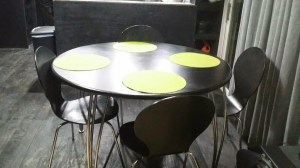 This is our old table that I revamped for the new kitchen. I stained the top, added different legs, and bought inexpensive chairs to finish the look....