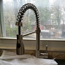 This is my seriously kick ass faucet. It is a pro pot scrubber. Makes what we bought before from Lowes look like 