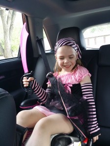 Dressing up as her version of Jake (from Jake And The Neverland Pirates)...